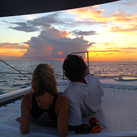 Romantic couple enjoys sunset cruise