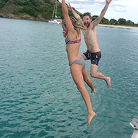 jumping off the catamaran into the Caribbean Sea