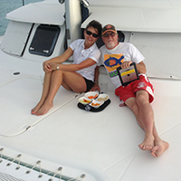 couple relaxing on their charter cruise