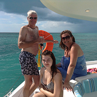 family enjoys afternoon sailing cruise